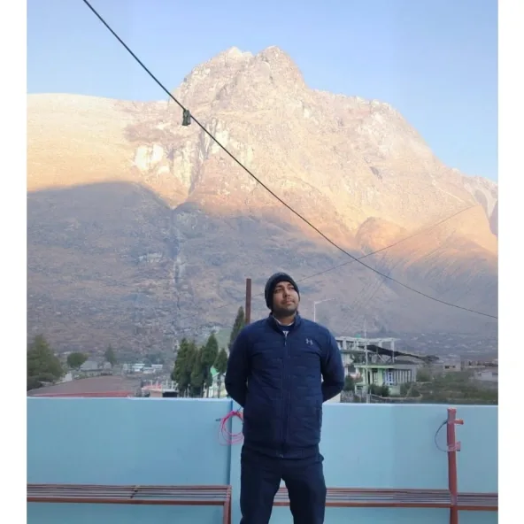 Shanu Quraishi in the mountains at sunrise